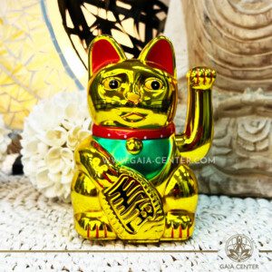 Feng Shui Cat Money Box Gold 6inch with moving beckoning paw at Gaia Center in Cyprus.