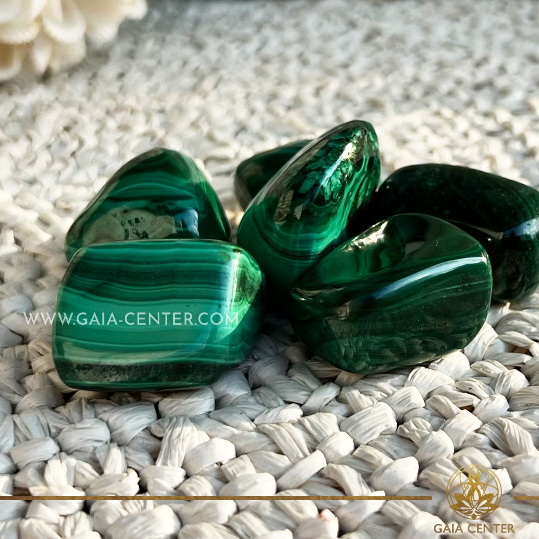 Malachite green Polished Tumbled stone at GAIA CENTER | Crystal Shop in Cyprus. Malachite is known for promoting emotional healing, enhancing intuition, and providing protection. Explore the holistic benefits of these polished tumbled stones in meditation, energy work, or as a beautiful addition to your crystal collection. Selection of top quality crystals available at our crystal shop in Cyprus. Cyprus islandwide delivery: Limassol, Paphos, Larnaca, Nicosia