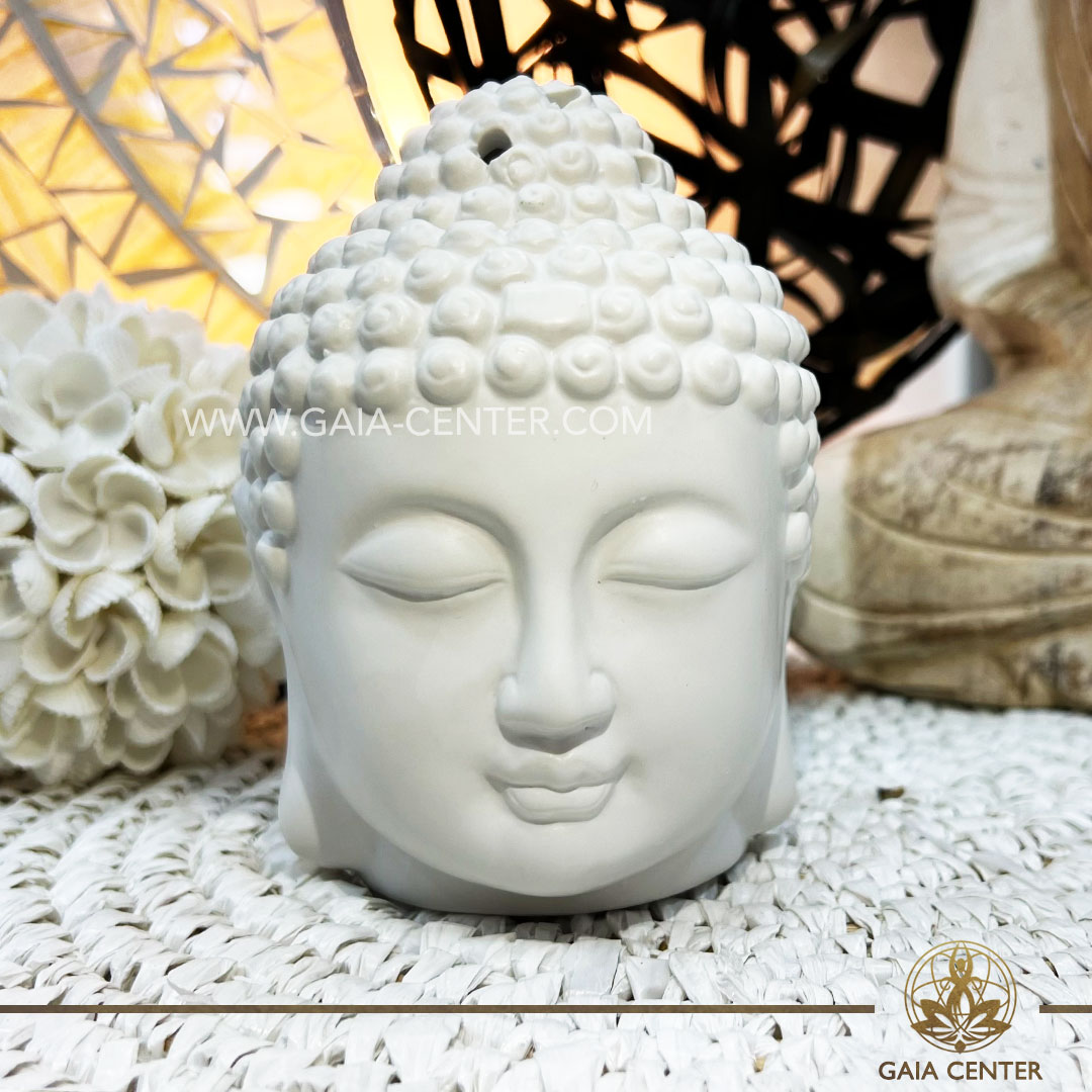 Essential Oil Burner or Wax Melt Burner - White Buddha Head Ceramic. Aroma diffusers and oil burners selection ​at Gaia Center Crystals Incense shop in Cyprus. Order online: Cyprus islandwide delivery: Limassol, Paphos, Nicosia, Larnaca