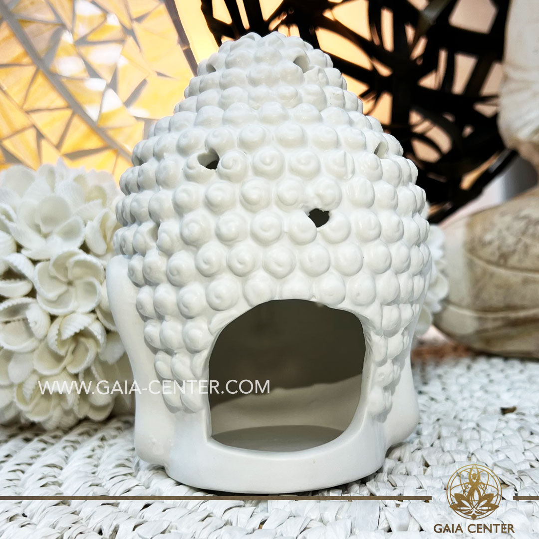 Essential Oil Burner or Wax Melt Burner - White Buddha Head Ceramic. Aroma diffusers and oil burners selection ​at Gaia Center Crystals Incense shop in Cyprus. Order online: Cyprus islandwide delivery: Limassol, Paphos, Nicosia, Larnaca
