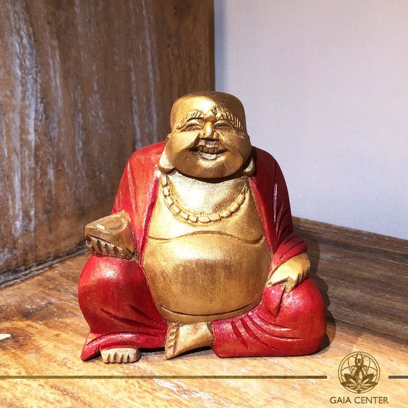 Happy Buddha Statue wooden hand carved - antique gold and red color finishing. Spiritual items at Gaia Center in Cyprus. Order online: https://www.gaia-center.com Cyprus and International Shipping.