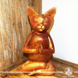 Yoga Cat Meditating Statue - wooded hand carved with antique gold and red color finishing. Spiritual items at Gaia Center in Cyprus. Order online: https://www.gaia-center.com Cyprus and International Shipping.