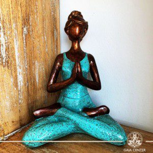 Yoga Lady Meditating Statue - Lotus pose and Hands in Namaste- casted lava sand with antique copper and turquoise color finishing. Spiritual items at Gaia Center in Cyprus. Order online: https://www.gaia-center.com Cyprus and International Shipping.