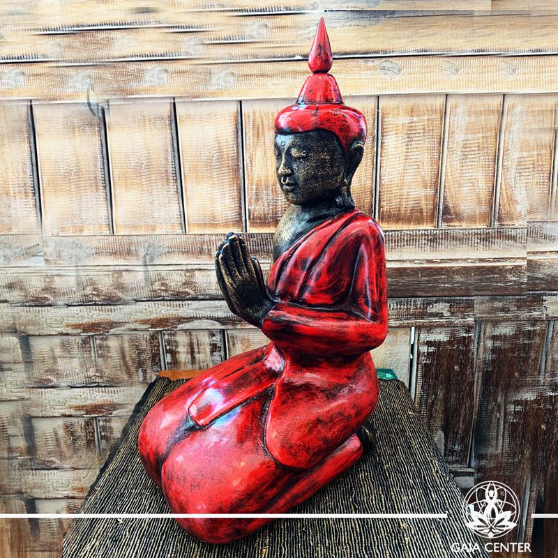 Buddha Statue red and antique gold finishing sitting and meditating with hands gesturing NAMASTE at Gaia Center in Cyprus. Shop online at https://gaia-center.com. Cyprus and Worldwide shipping.