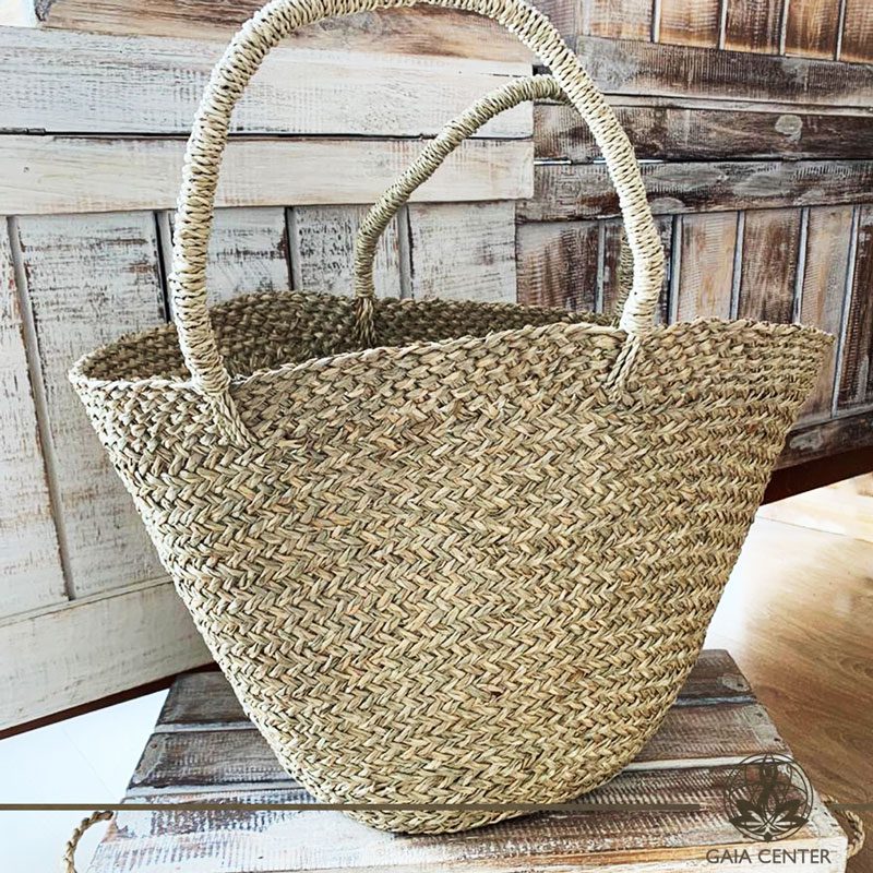 Natural color straw bag. Summer essentials jewellery and bags at Gaia Center in Cyprus. Shop online at https://gaia-center.com. Cyprus and Worldwide shipping.