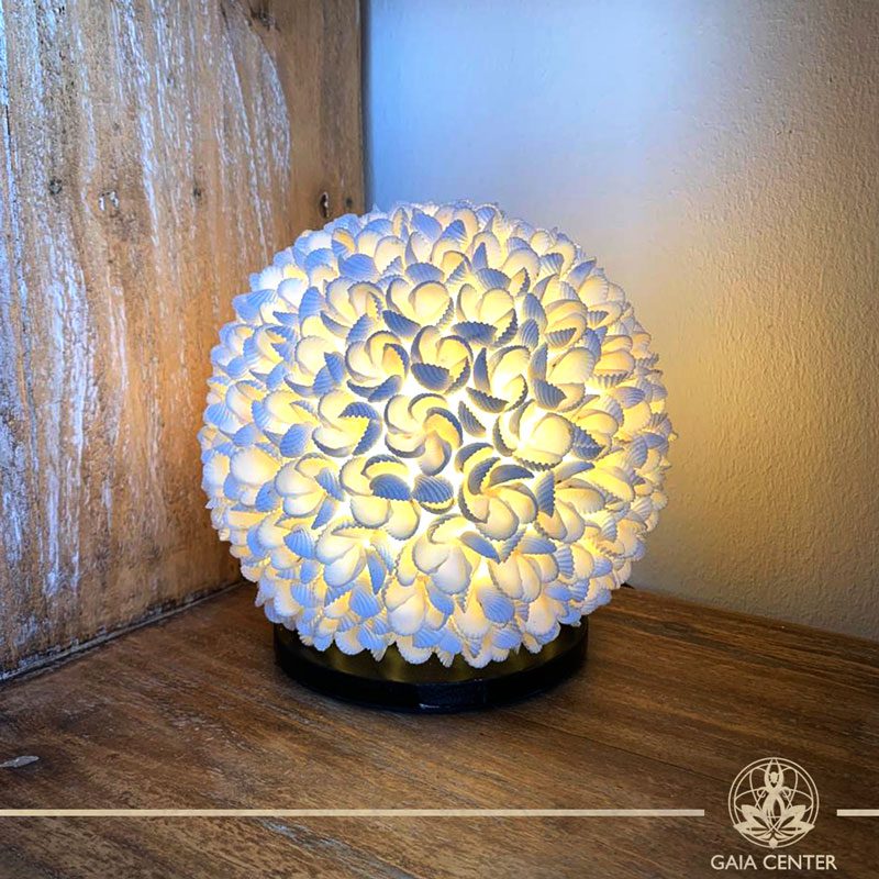 Natural sea shell decor lamp at Gaia Center in Cyprus. Shop online at https://gaia-center.com. Cyprus and Worldwide shipping.
