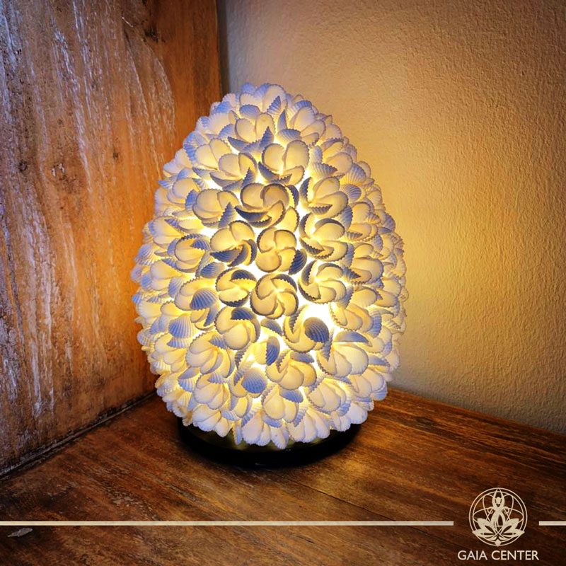 Natural sea shell decor lamp at Gaia Center in Cyprus. Shop online at https://gaia-center.com. Cyprus and Worldwide shipping.
