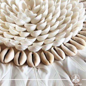 Natural seashell and feathers wall decor at Gaia Center in Cyprus. Shop online at https://gaia-center.com. Cyprus and Worldwide shipping.