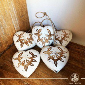 Wooden hand carved hearts on a string white finishing at Gaia Center in Cyprus. Shop online at https://gaia-center.com. Cyprus and Worldwide shipping.