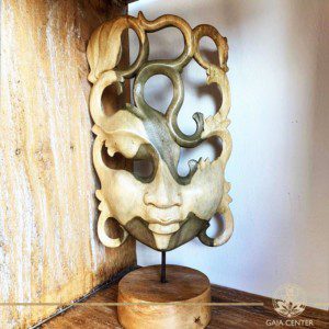 Wooden mask stand decor hand carved at Gaia Center in Cyprus. Shop online at https://gaia-center.com. Cyprus and Worldwide shipping.