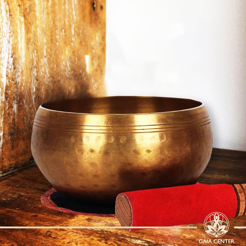 Singing Bowl 12cm diameter with a fabric mat and wooden striker at Gaia Center | Cyprus.