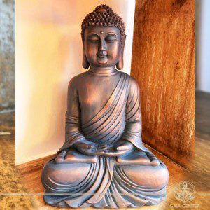 Buddha Statue meditating pose antique blue and copper color finishing at Gaia Center | Cyprus.