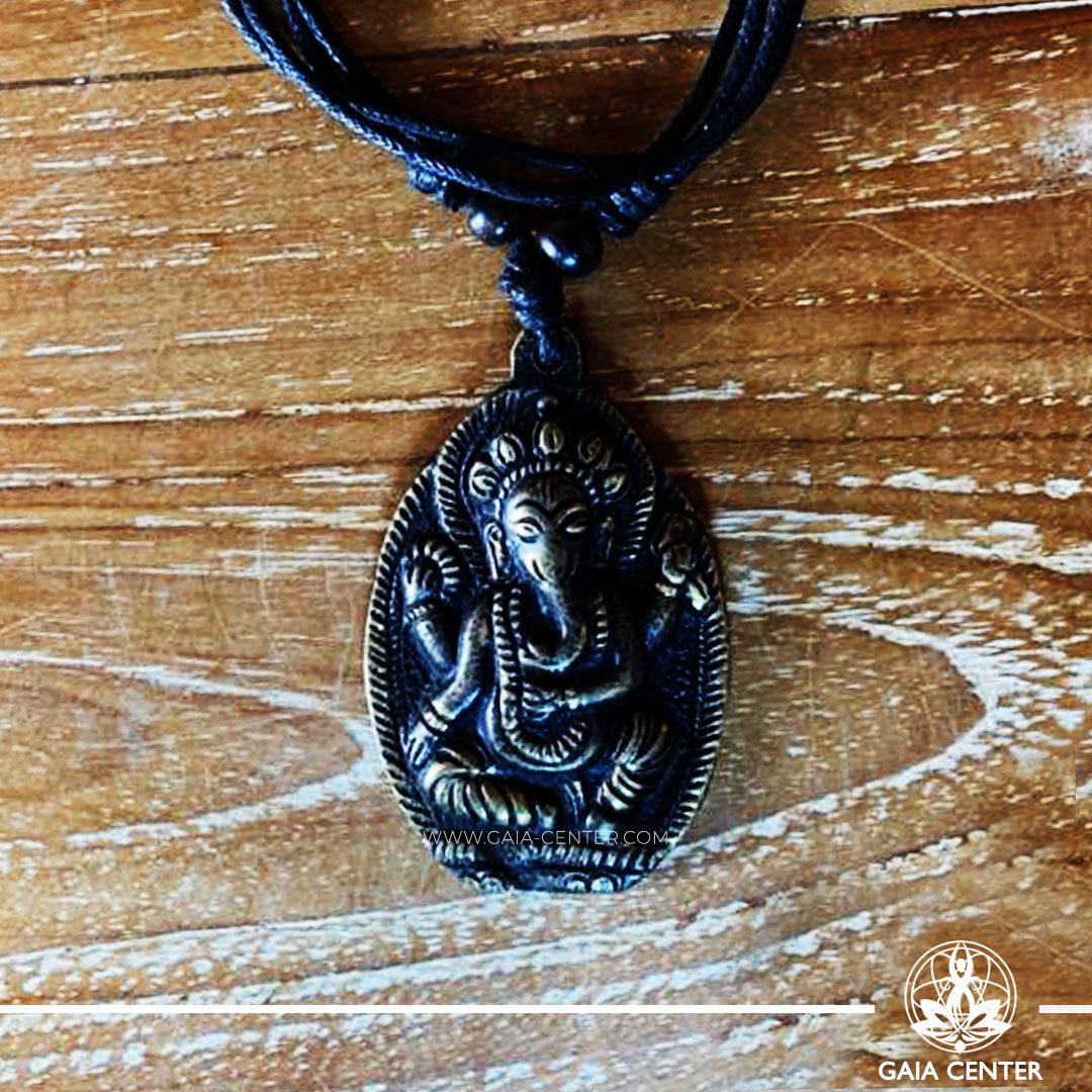 Tibetan Pendant Ganesha, elephant for protection. Made from metal with engraved design, on an adjustable black string. Tibet Selection of Tibetan Jewelry made from crystals, gemstones, combination of metals at Gaia Center | Cyprus.
