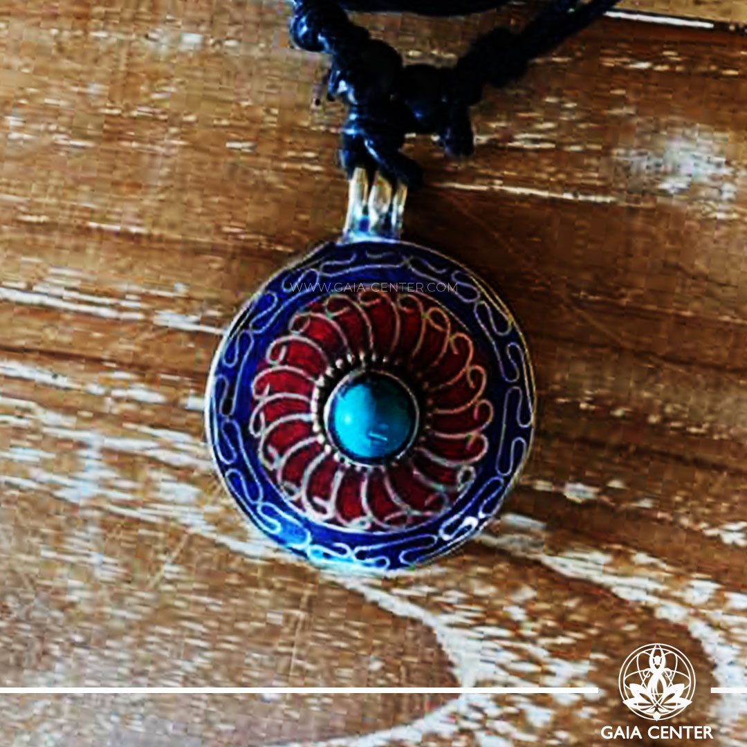 Tibetan Pendant Flower symbol design. Red coral, lapis lazuli and turquoise. Adjustable black string. Selection of Tibetan Jewelry made of crystals, gemstones, combination of metals at Gaia Center | Cyprus.