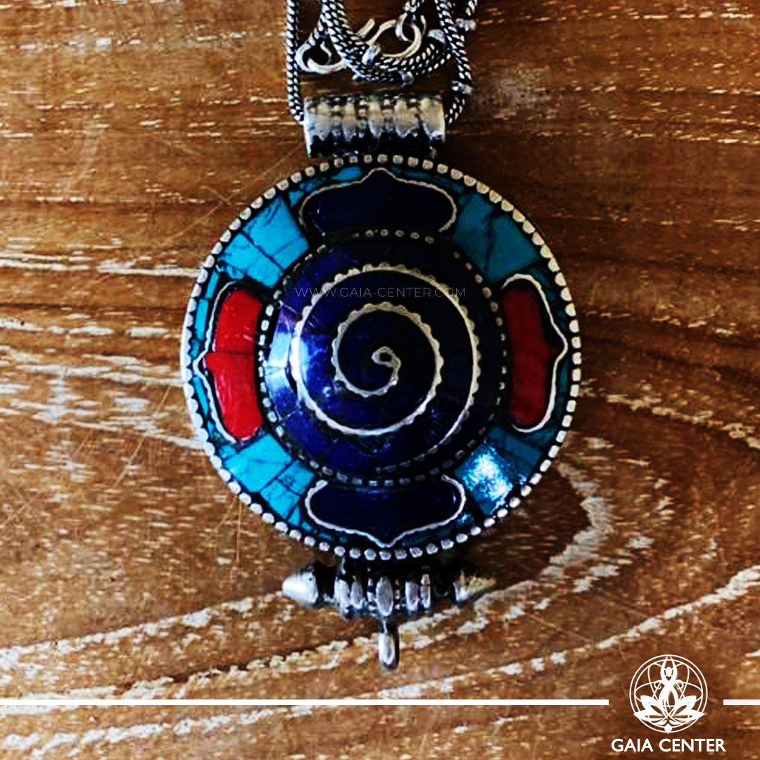 Tibetan gau pendant amulet box selection with semiprecious stones. Tibetan Pendant inlaid with turquoise, coral and lapis lazuli. Long chain. Selection of Tibetan Jewelry made from crystals, gemstones at Gaia Center | Cyprus.