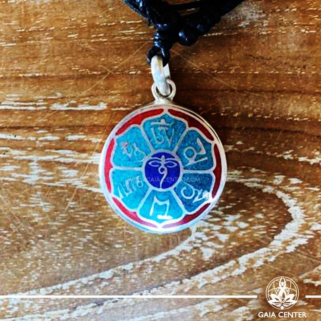 Tibetan Pendant Buddha Eyes or Wisdom symbol and mantra or prayer design. Adjustable black string. Selection of Tibetan Jewelry made of crystals, gemstones, combination of metals at Gaia Center | Cyprus.