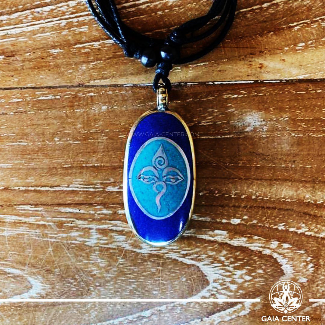 Tibetan Pendant Buddha Eyes or Wisdom eyes. Lapis lazuli and turquoise. Adjustable black string. Selection of Tibetan Jewelry made of crystals, gemstones, combination of metals at Gaia Center | Cyprus.