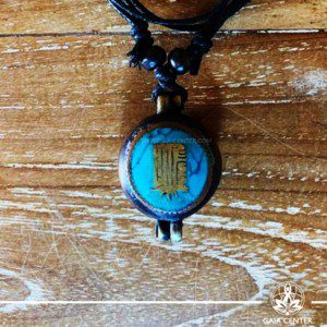 Tibetan Gau box Antique Pendant Kalachakra buddhist symbol. Metal inlaid with turquoise. Adjustable black string. Selection of Tibetan Jewelry made from crystals, gemstones, combination of metals at Gaia Center | Cyprus.