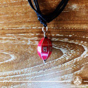 Tibetan Pendant Red color Drop Style design. Made from combination of metals and semiprecious stone. Adjustable black cord or string. Selection of Tibetan jewelry at Gaia Center | Cyprus.