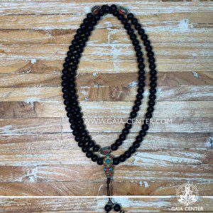 Crystal Malas Selection: Tibetan Prayer Mala from Black Shiva Lingham Stone, Blue Turquoise and tibetan beads design. Crystal and Wooden malas collection Gaia Center | Cyprus.