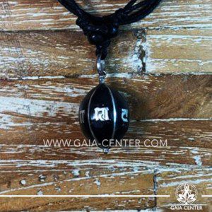 Tibetan Pendant Black Drop Style design. Made from combination of metals and semiprecious stone. Adjustable black cord or string. Selection of Tibetan jewelry at Gaia Center | Cyprus.