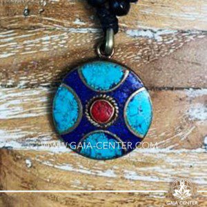 Tibetan Pendant. Metal inlaid with semiprecious gemstones. Adjustable black string. Selection of Tibetan Jewelry made from crystals, gemstones, combination of metals at Gaia Center | Cyprus.