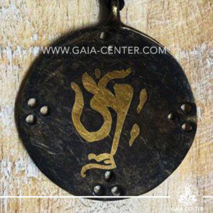 Tibetan Pendant Om symbol design. Made from combination of metals, silver color style. On an adjustable black string. Tibet Selection of Tibetan Jewelry made from crystals, gemstones, combination of metals at Gaia Center | Cyprus.