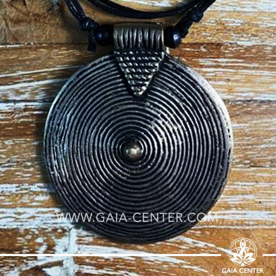 Tibetan Pendant Spiral Bronze color design. Made from combination of metals. Comes with adjustable black string. Tibet Selection of Tibetan Jewelry made from crystals, gemstones, combination of metals at Gaia Center | Cyprus.