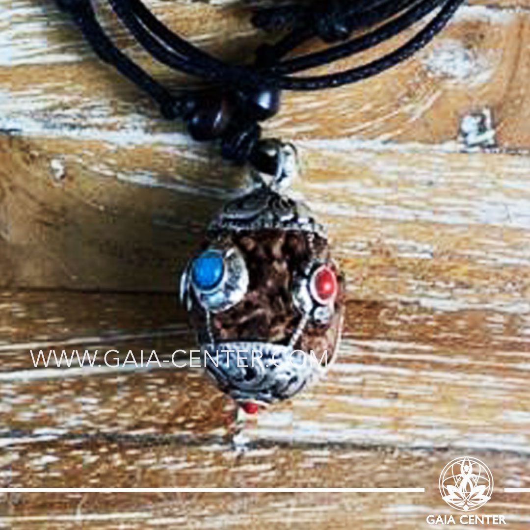 Tibetan Pendant Rudraksha. Adjustable black string. Selection of Tibetan Jewelry made from crystals, gemstones, combination of metals at Gaia Center | Cyprus.