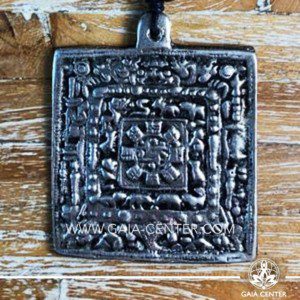 Tibetan Pendant Square Calendar design. Made from combination of metals, silver color style. On an adjustable black string. Tibet Selection of Tibetan Jewelry made from crystals, gemstones, combination of metals at Gaia Center | Cyprus.