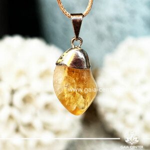Crystal Pendant - Yellow Citrine polished with electroplated bail with string at GAIA CENTER Crystal Shop CYPRUS. Crystal jewellery and crystal pendants at Gaia Center crystal shop in Cyprus. Order online top quality crystals, Cyprus islandwide delivery: Limassol, Larnaca, Paphos, Nicosia. Europe and Worldwide shipping.