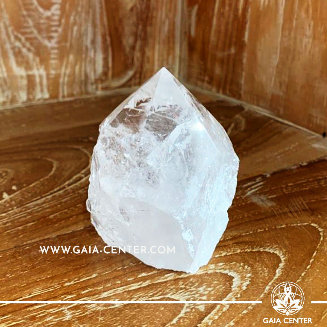 Crystal Clear Raw Quartz Rough Cut Base Polished Point from Brazil. Crystal size: H:85mm L:65mm W:70mm. Crystal and Gemstone selection at Gaia Center | Cyprus.