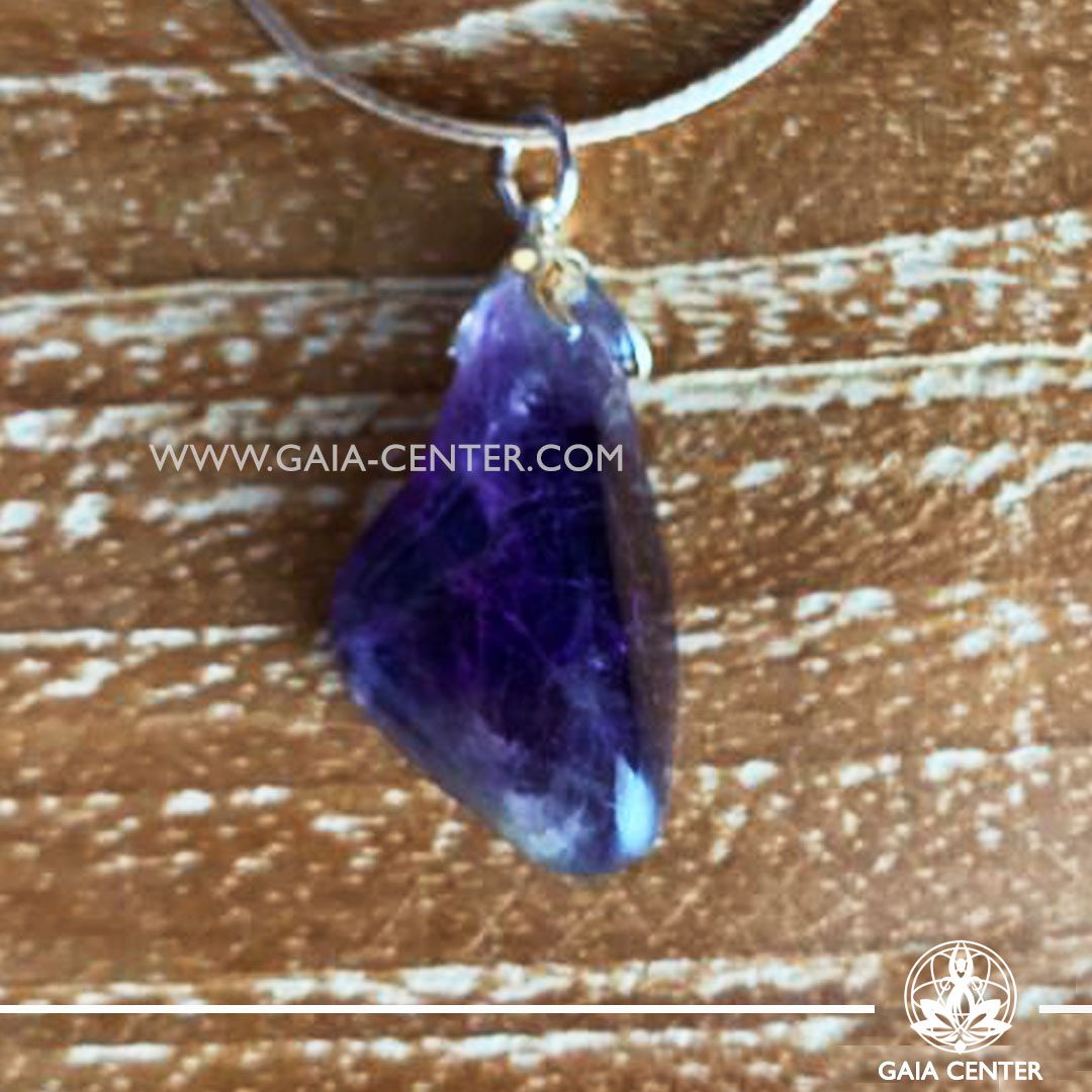 Crystal pendant - Amethyst Dark Quartz point with metal flower design and adjustable cord. Crystal and Gemstone Jewellery selection at GAIA CENTER in Cyprus.