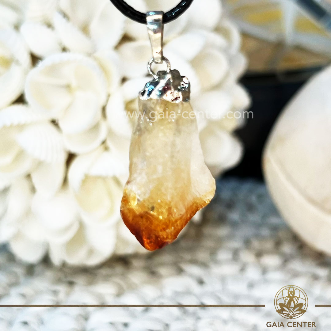 Crystal Pendant - Yellow Citrine with electroplated bail with string zen design at GAIA CENTER Crystal Shop CYPRUS. Crystal jewellery and crystal pendants at Gaia Center crystal shop in Cyprus. Order online top quality crystals, Cyprus islandwide delivery: Limassol, Larnaca, Paphos, Nicosia. Europe and Worldwide shipping.