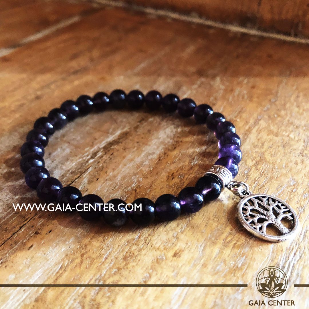 Crystal Bracelet Amethyst Quartz with metal tree charm and Elastic string - made with 8mm gemstone beads. Crystal and Gemstone Jewellery Selection at Gaia Center in Cyprus.
