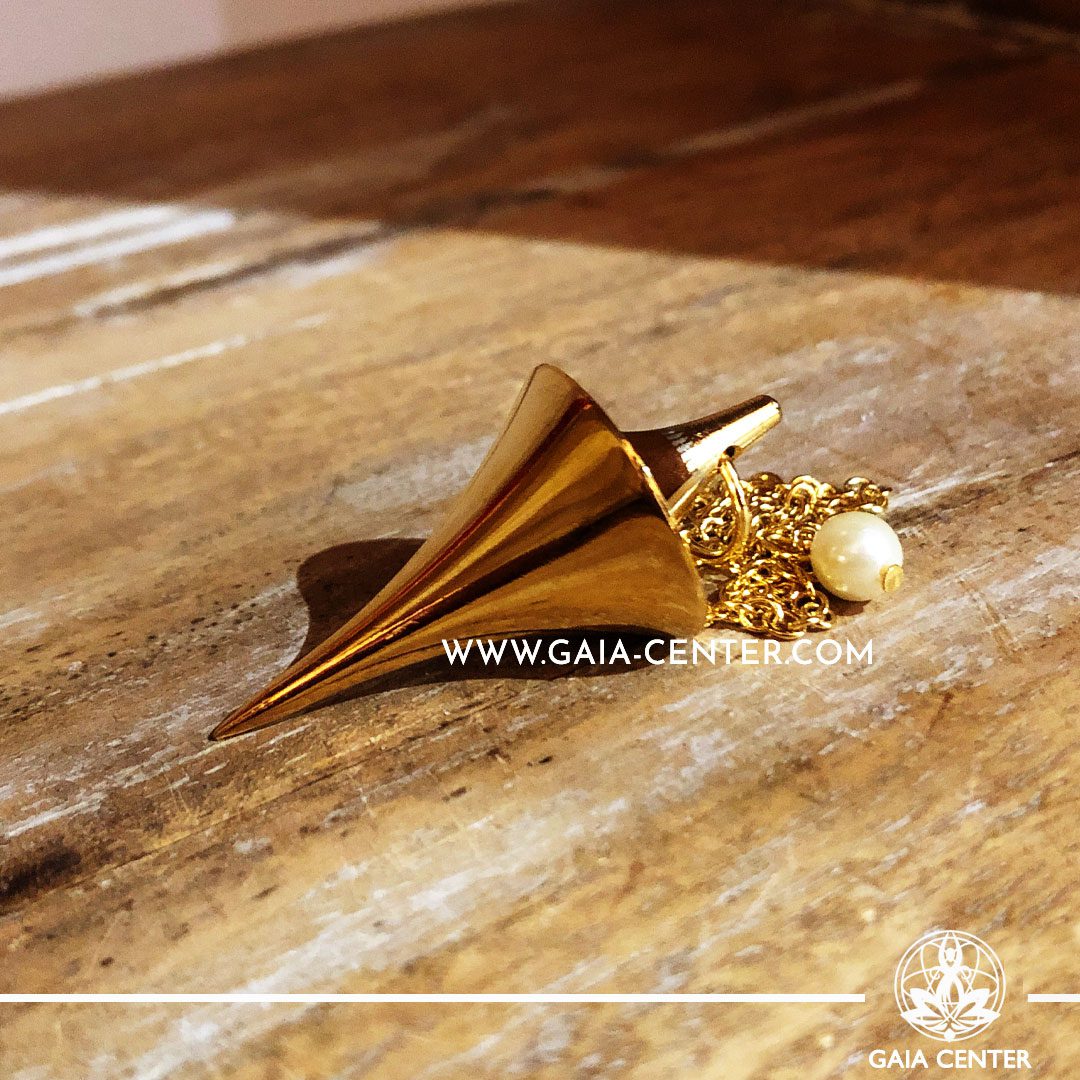 Dowsing Pendulum Metal Large Cone design made from brass metal in golden color. Metal and Crystal Dowsing Pendulum Selection at Gaia Center in Cyprus.