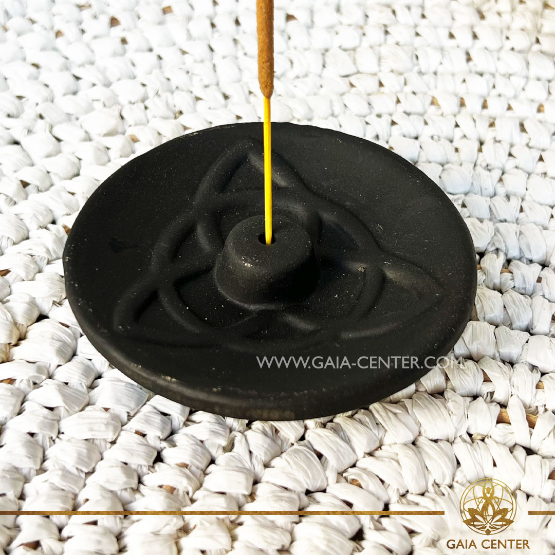 Incense Holder or Ash Catcher plate for one incense sticks or Palo Santo Wood Holder. Made from clay-based unglazed ceramic with artistic design: black color and triquetra symbol. Incense burners selection at Gaia Center Crystals and Incense Shop in Cyprus.