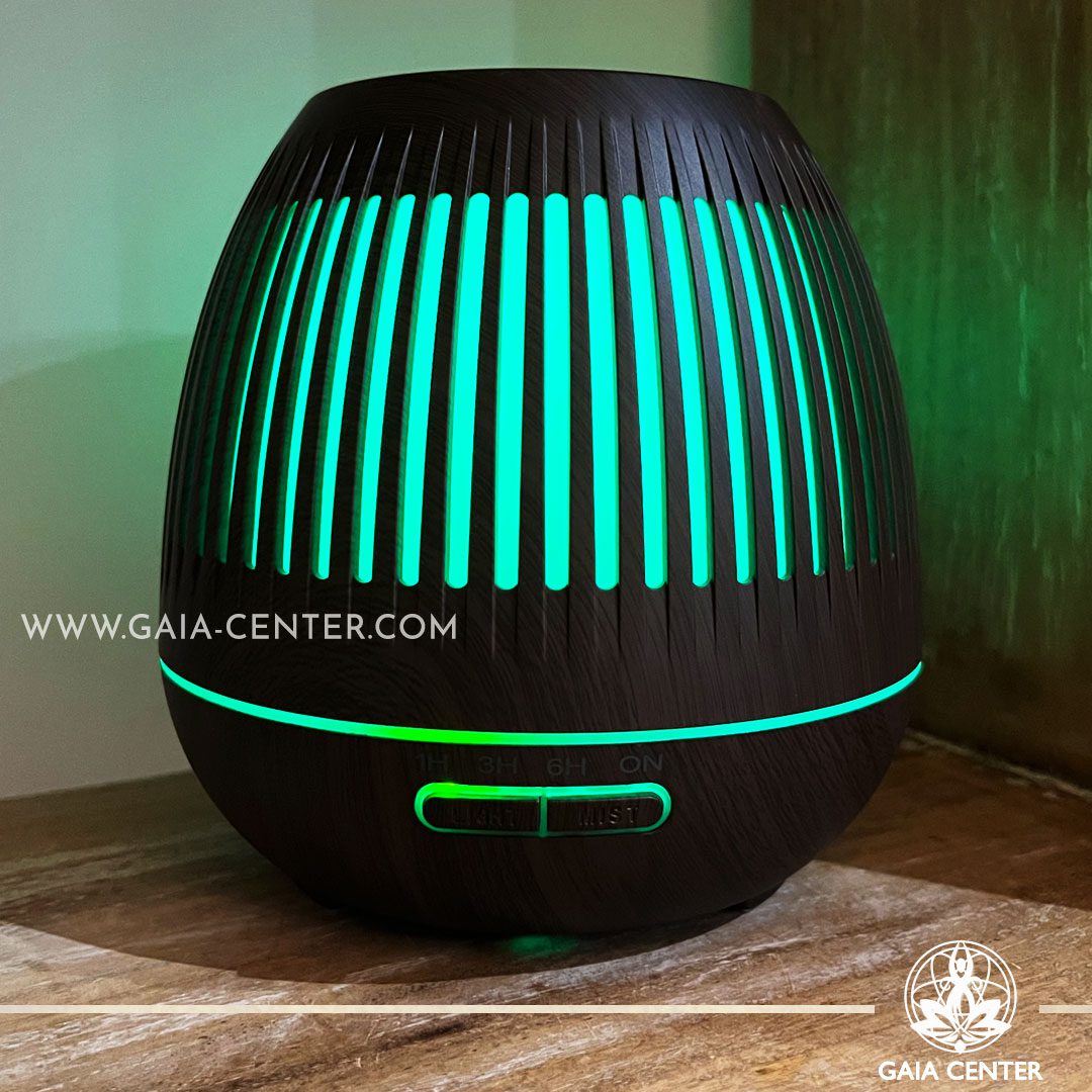 Aroma Diffuser Ultrasonic Humidifier for essential and aroma oils. Gaia dark wood Design with 400ml water capacity, 7 led colors. Electrical cable included. Selection of Aroma Humidifiers and Aromatic Essential Oils at Gaia Center in Cyprus. Order online, Cyprus islandwide delivery: Limassol, Larnaca, Paphos, Nicosia