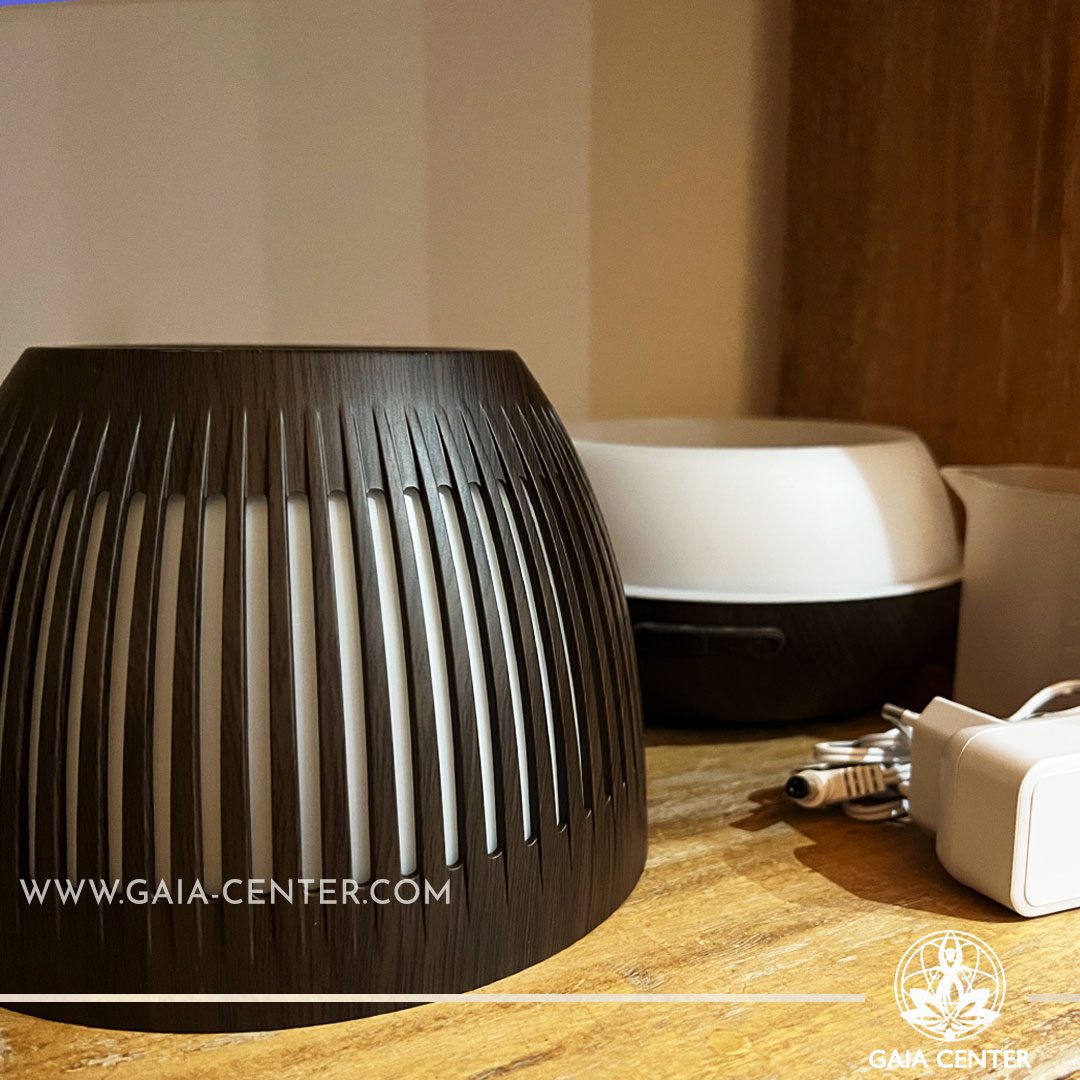 Aroma Diffuser Ultrasonic Humidifier for essential and aroma oils. Gaia dark wood Design with 400ml water capacity, 7 led colors. Electrical cable included. Selection of Aroma Humidifiers and Aromatic Essential Oils at Gaia Center in Cyprus. Order online, Cyprus islandwide delivery: Limassol, Larnaca, Paphos, Nicosia