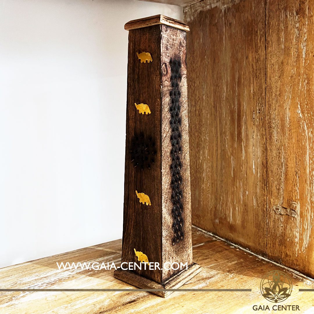 Tower Incense Holder or Ash Catcher - natural color wooden box. Holds four aroma incense sticks and one incense pyramids or cone. Made from wood with artistic design: metal elephants gold color symbols. Incense burners selection at Gaia Center | Cyprus. Order online, Cyprus islandwide delivery: Limassol, Larnaca, Nicosia, Paphos. Europe and worldwide shipping.