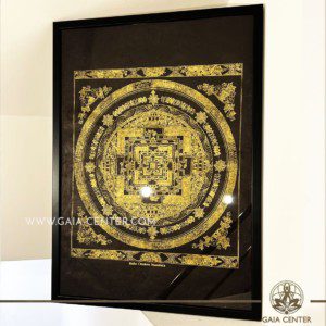 Tibetan Mandala Kala Chakra gold and black color in the frame. Origin: Nepal Frame size: 72x52cm Wall Ornament selection at Gaia Center | Cyprus.