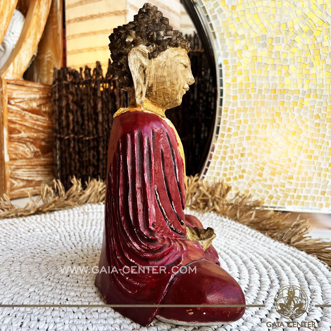 Buddha Statue made from teak wood and hand carved by Balinese artisans. Glossy finishing. Decore and spiritual items at Gaia Center in Cyprus. Shop online at https://gaia-center.com. Cyprus island delivery: Limassol, Nicosia, Paphos, Larnaca. Europe and Worldwide shipping.