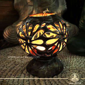 Coconut shell teal light candle holder. Soft ambient made from natural eco friendly materials - coconut hand carved by Balinese artisans. Artistic design with white wash elements. Decore and spiritual items at Gaia Center in Cyprus. Shop online at https://gaia-center.com. Cyprus island delivery: Limassol, Nicosia, Paphos, Larnaca. Europe and Worldwide shipping.