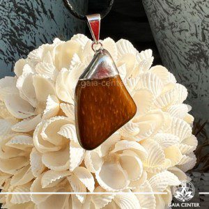 Crystal Pendant - Tigers Eye with electroplated bail crystal rough metal cap design at GAIA CENTER Crystal Shop CYPRUS. Crystal jewellery and crystal pendants at Gaia Center crystal shop in Cyprus. Order online top quality crystals, Cyprus islandwide delivery: Limassol, Larnaca, Paphos, Nicosia. Europe and Worldwide shipping.