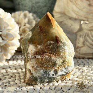 Crystal Green Onyx Quartz Rough Cut Base Polished Point from Brazil. Crystal points, towers and obelisks selection at GAIA CENTER Crystal Shop in CYPRUS. Order online, Cyprus islandwide delivery: Limassol, Larnaca, Paphos, Nicosia. Europe and Worldwide shipping.
