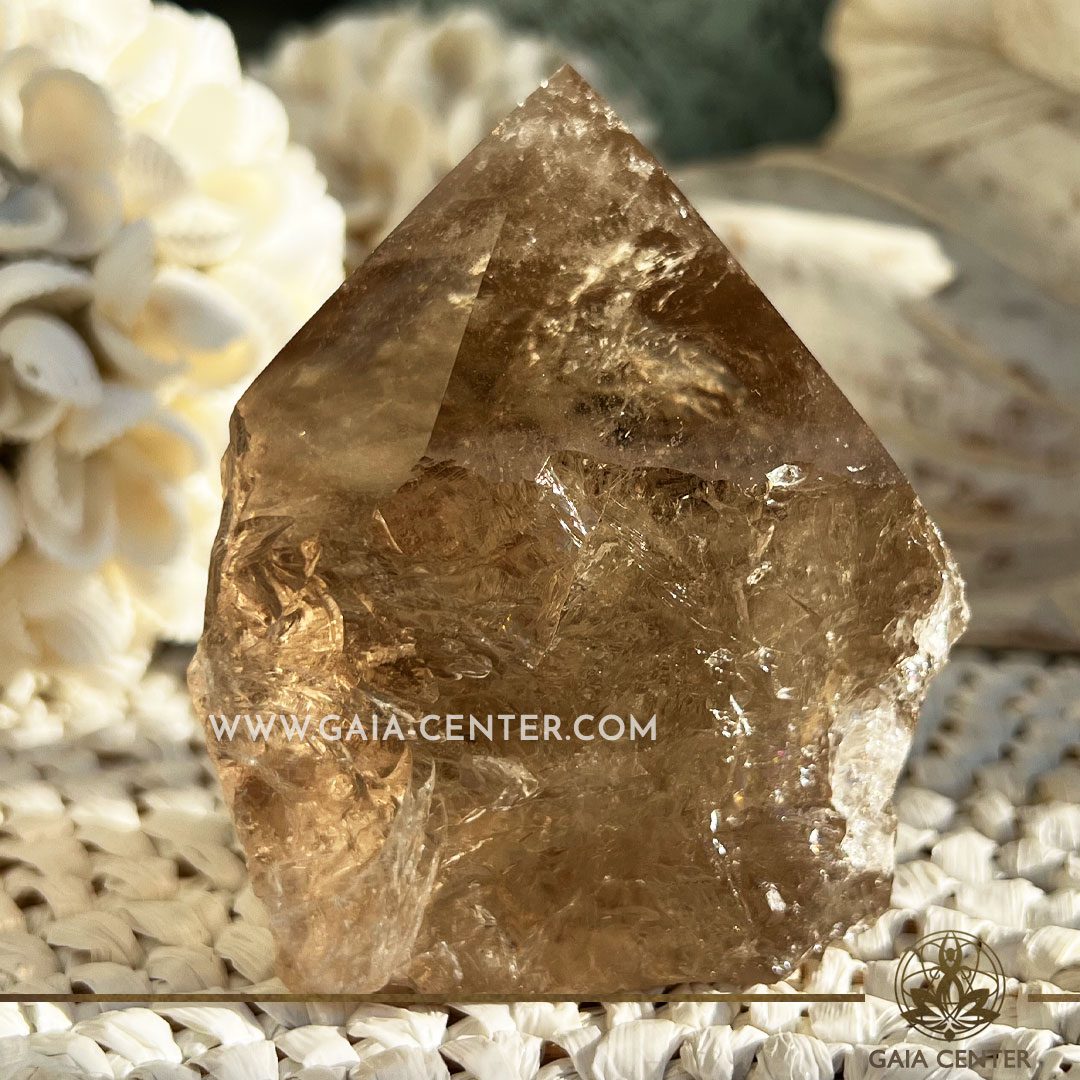 Crystal Smoky Quartz Rough Cut Base Polished Point from Brazil. Crystal points, towers and obelisks selection at GAIA CENTER Crystal Shop in CYPRUS. Order online, Cyprus islandwide delivery: Limassol, Larnaca, Paphos, Nicosia. Europe and Worldwide shipping.