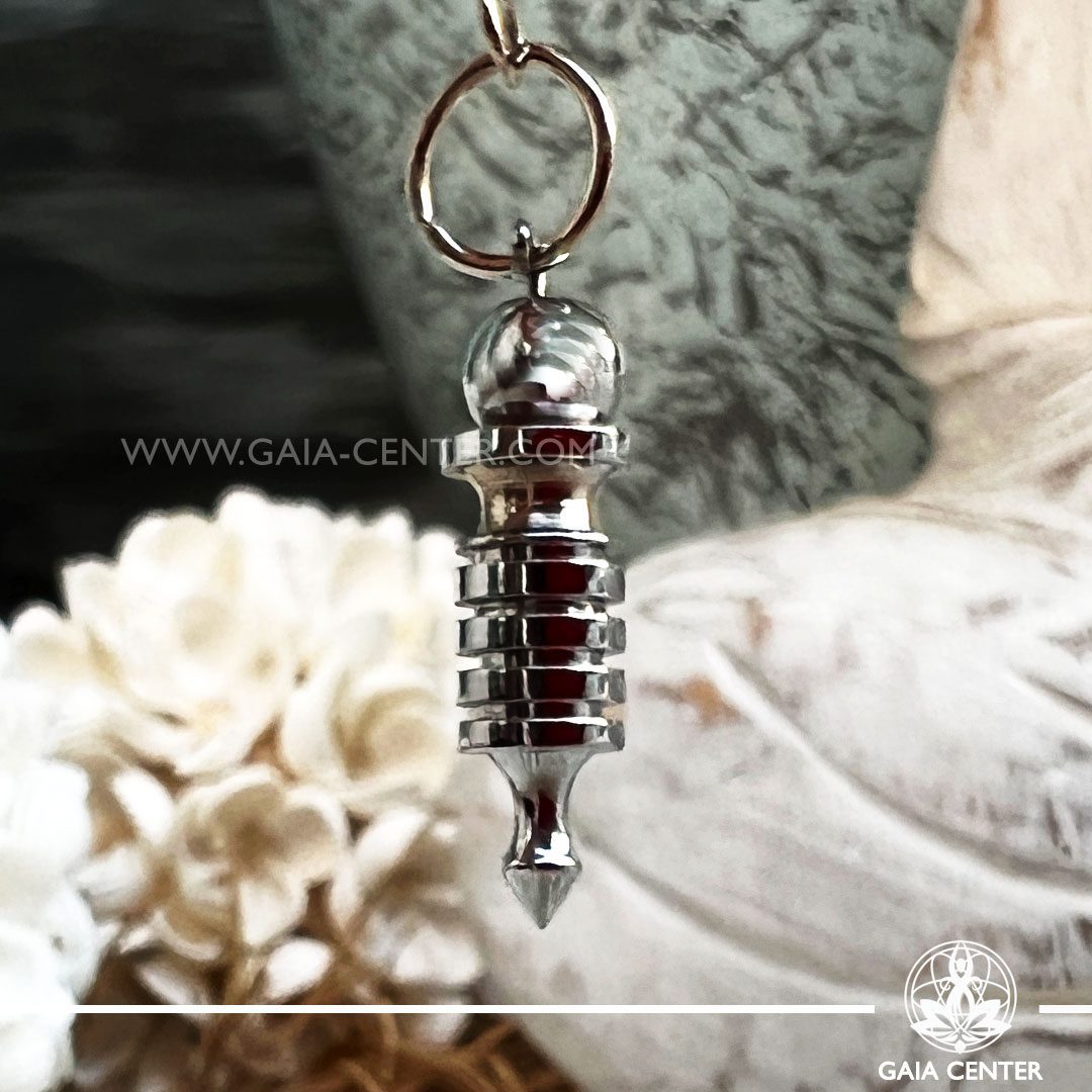 Metal Dowsing Pendulum Isis cone design silver color at Gaia Center Crystal shop in Cyprus. Crystal and Gemstone Jewellery Selection at Gaia Center in Cyprus. Order online, Cyprus islandwide delivery: Limassol, Larnaca, Paphos, Nicosia. Europe and Worldwide shipping.