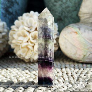 Rainbow Fluorite Crystal Obelisk. Crystal points, towers and obelisks selection at Gaia Center in Cyprus. Order online, Cyprus islandwide delivery: Limassol, Larnaca, Paphos, Nicosia. Europe and Worldwide shipping.