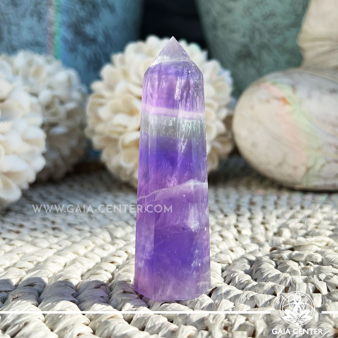 Purple Fluorite Crystal Obelisk. Crystal points, towers and obelisks selection at Gaia Center in Cyprus. Order online, Cyprus islandwide delivery: Limassol, Larnaca, Paphos, Nicosia. Europe and Worldwide shipping.