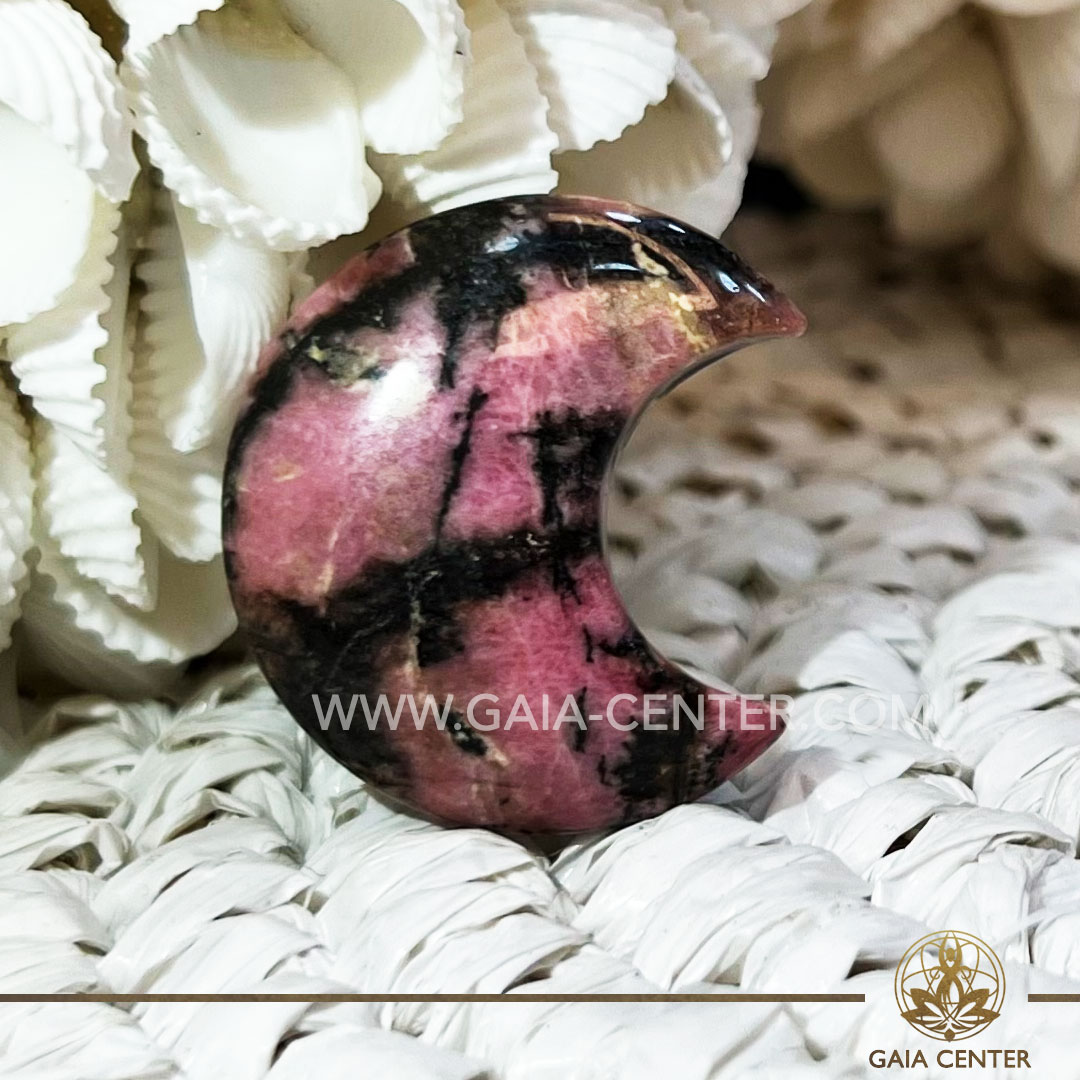 Crystal Moon Shape - Rhodonite. Crystals and Gemstone selection at Gaia Center Crystal Shop Cyprus. Shop online at https://gaia-center.com. Cyprus island delivery: Limassol, Nicosia, Paphos, Larnaca. Europe and Worldwide shipping.
